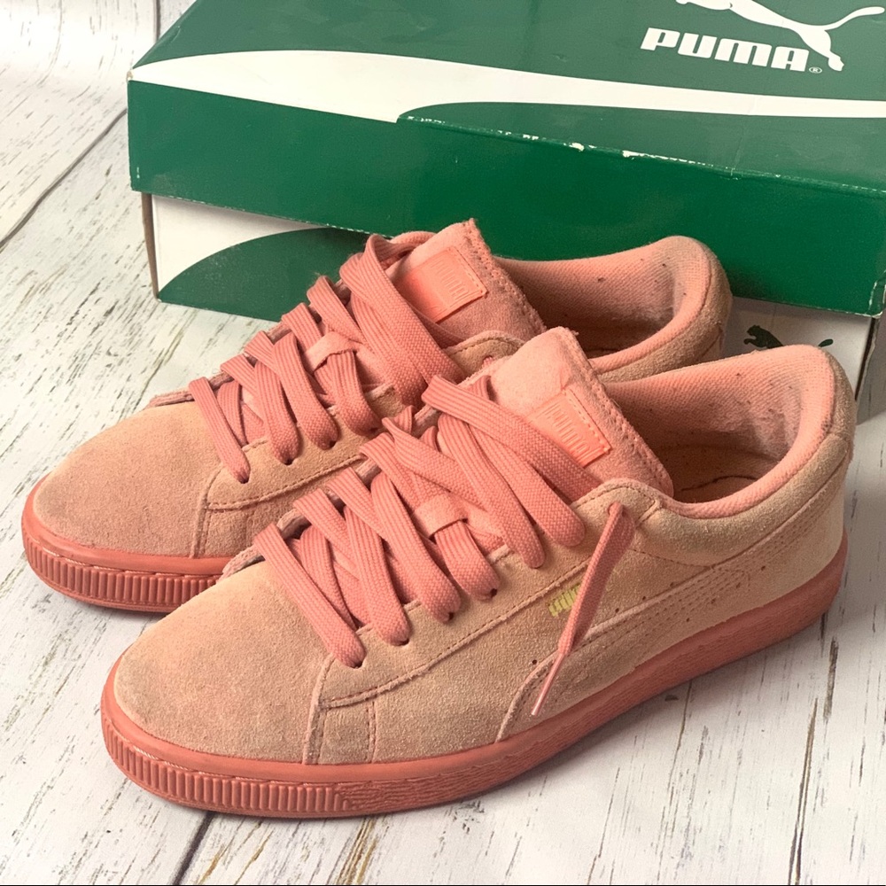 Pink suede Pumas